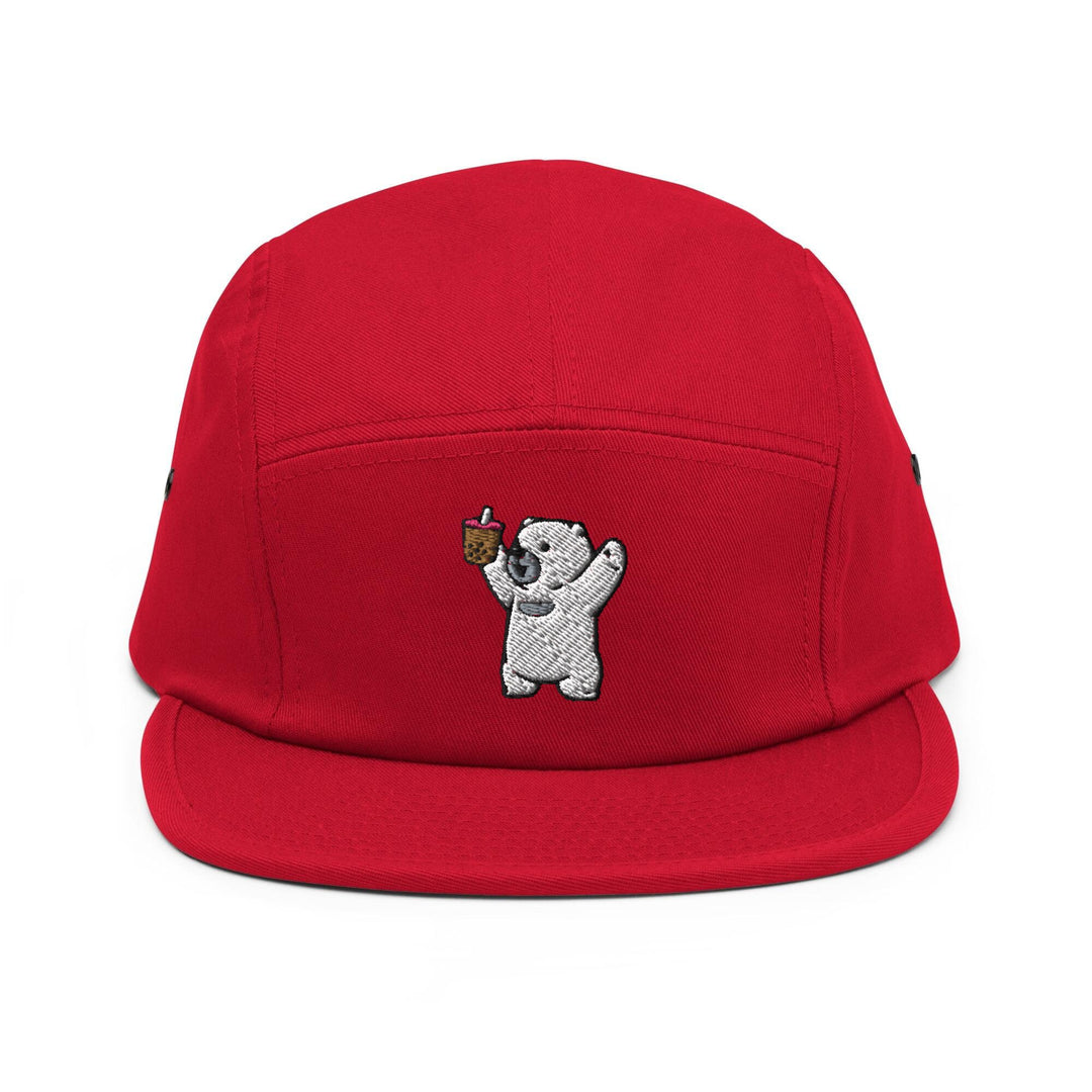 a red hat with a white bear on it