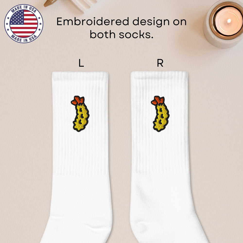 a pair of socks with a picture of a giraffe on them
