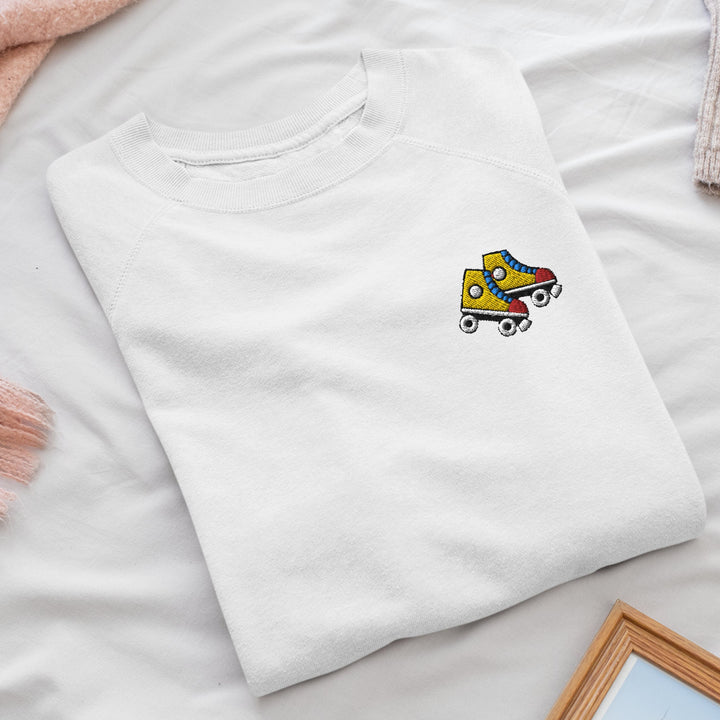 a white t - shirt with a cartoon car on it