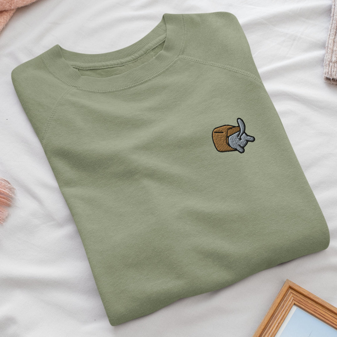 a green t - shirt with a picture of a coffee cup on it