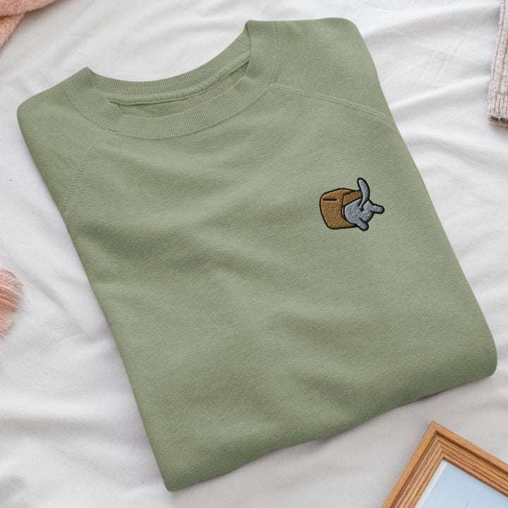 a green t - shirt with a picture of a coffee cup on it