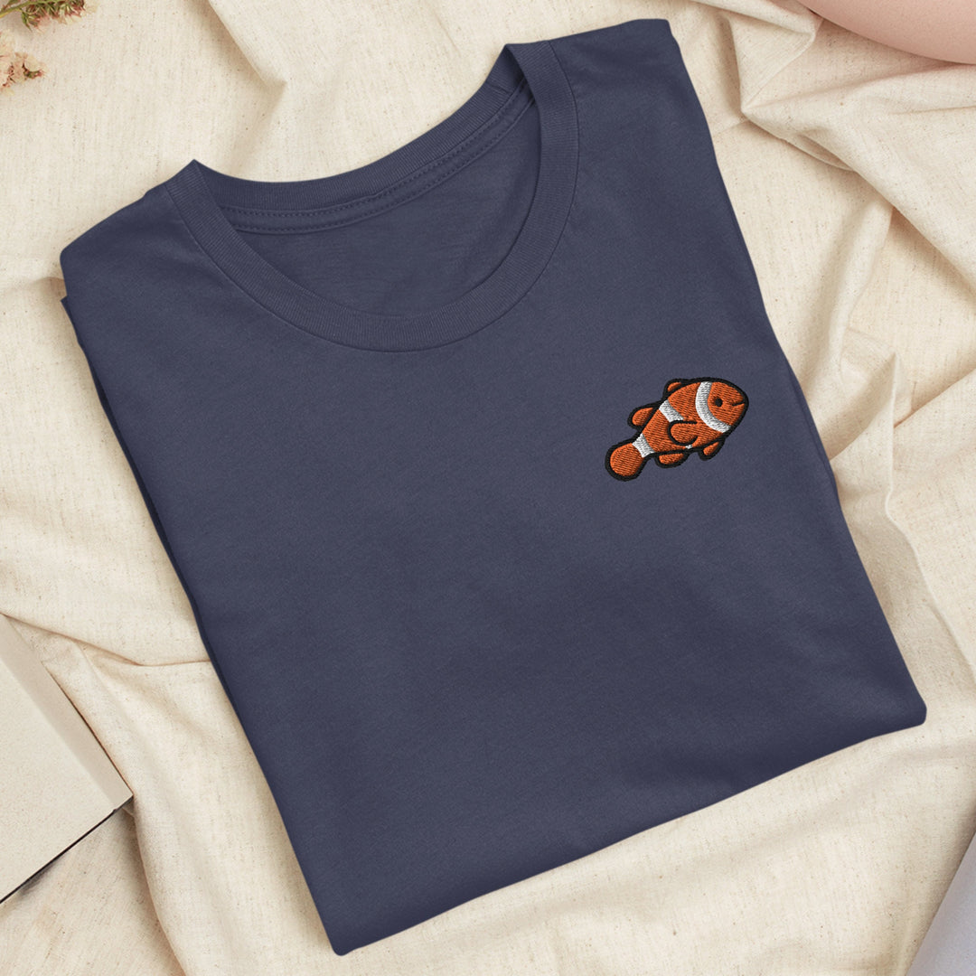 a blue t - shirt with an orange clown on it