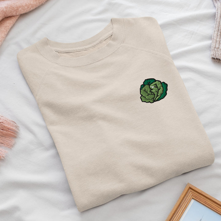 a t - shirt with a picture of a broccoli on it