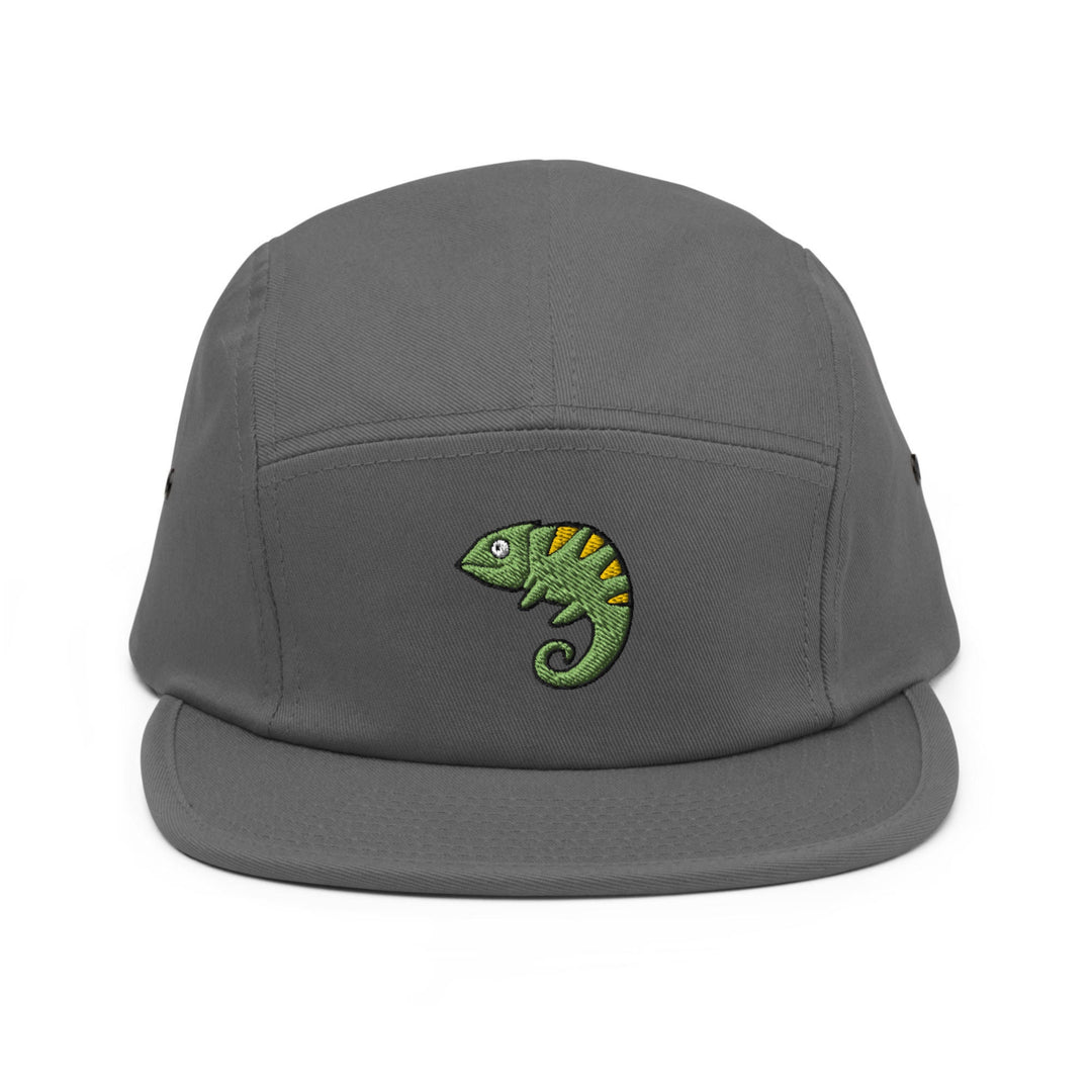 a grey hat with a green chamelon embroidered on it