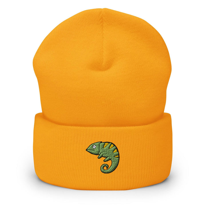 a yellow beanie with a green chamelon embroidered on it