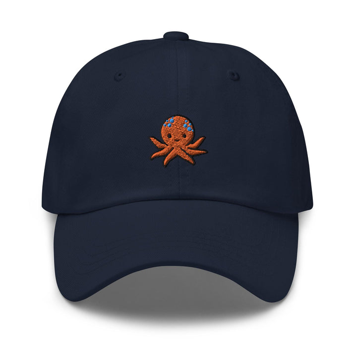 a blue hat with an octopus embroidered on it