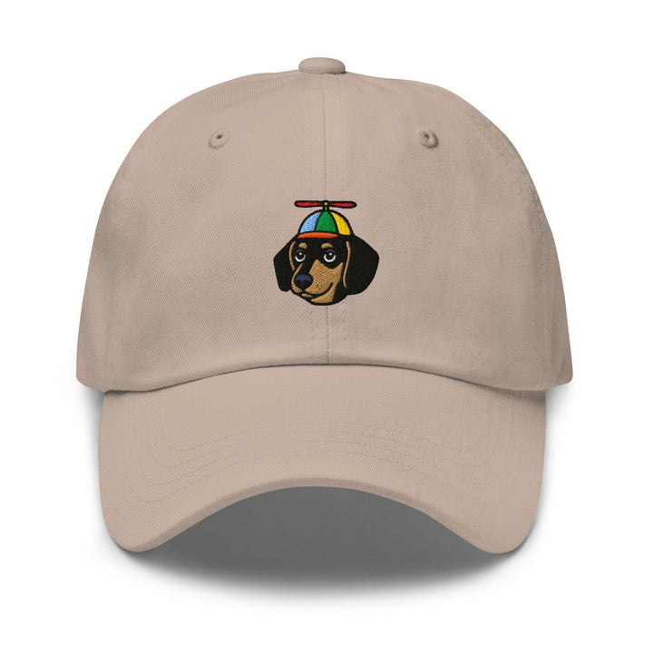 a baseball cap with a dog wearing a hat on it