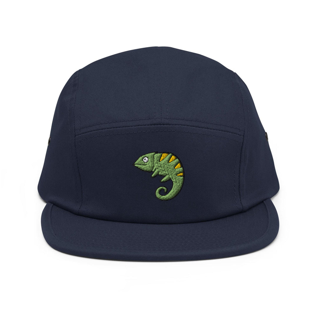 a blue hat with a green chamelon embroidered on it