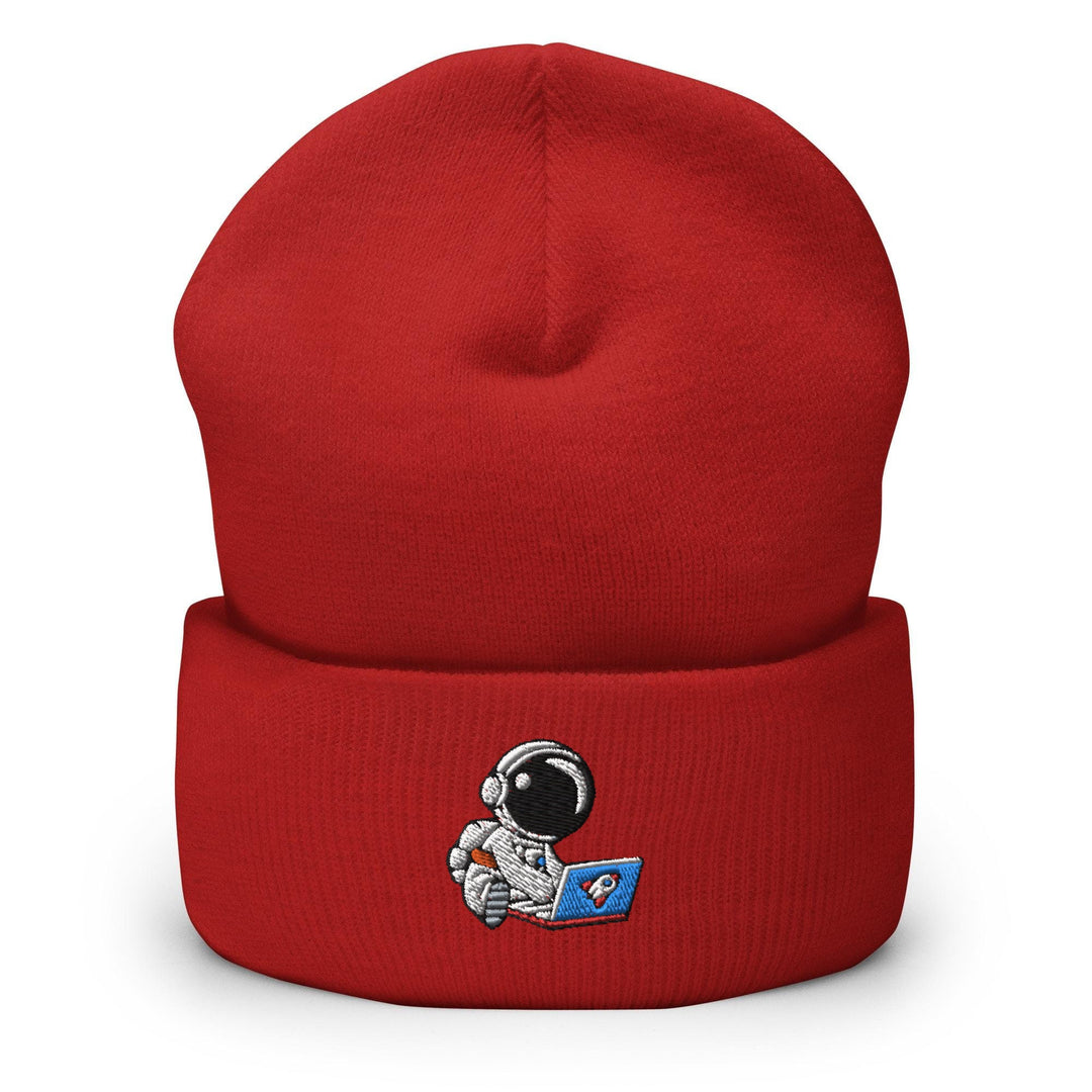a red beanie with an astronaut on it