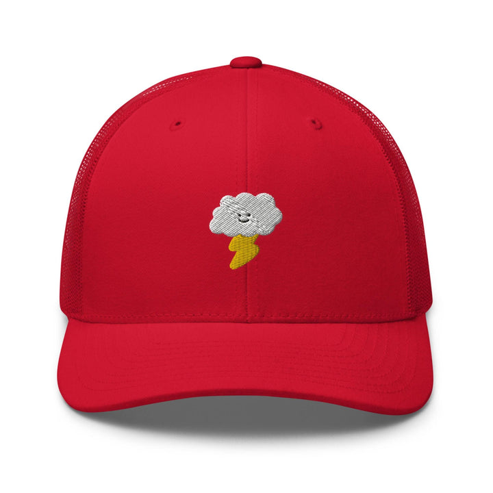 a red hat with a cartoon cloud on it