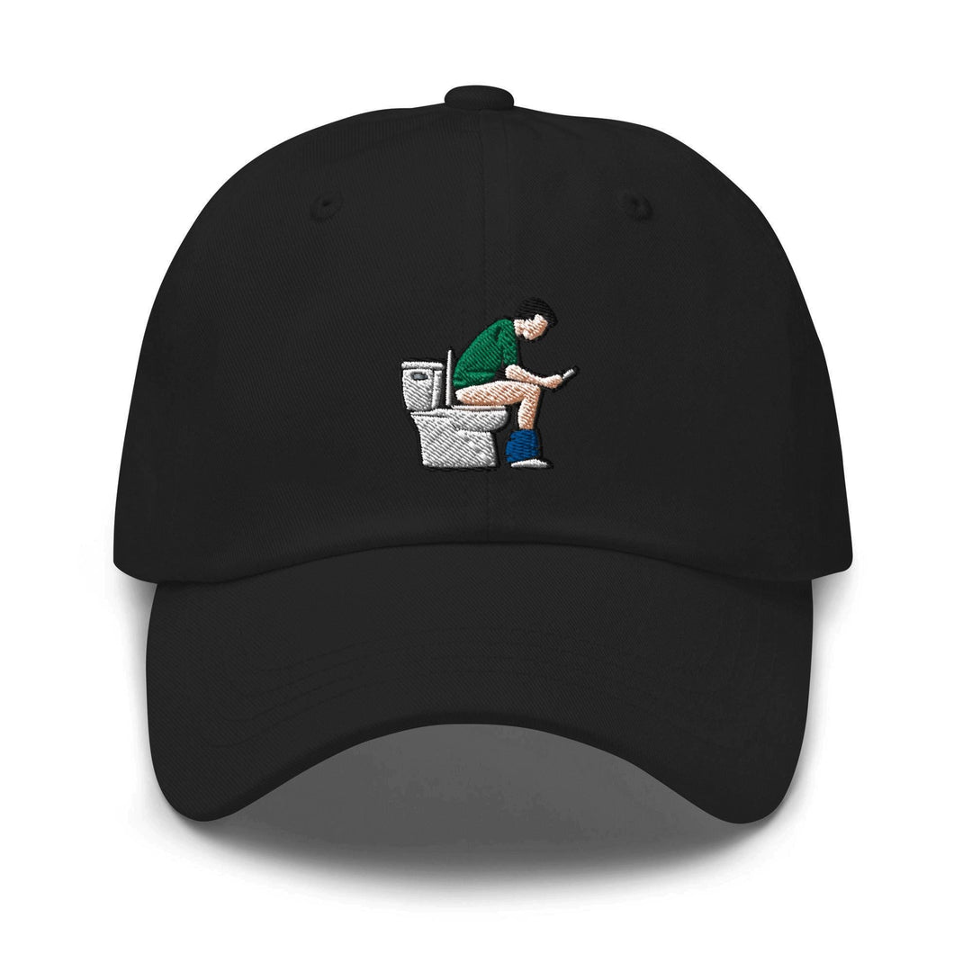 a black hat with a picture of a man sitting on a toilet