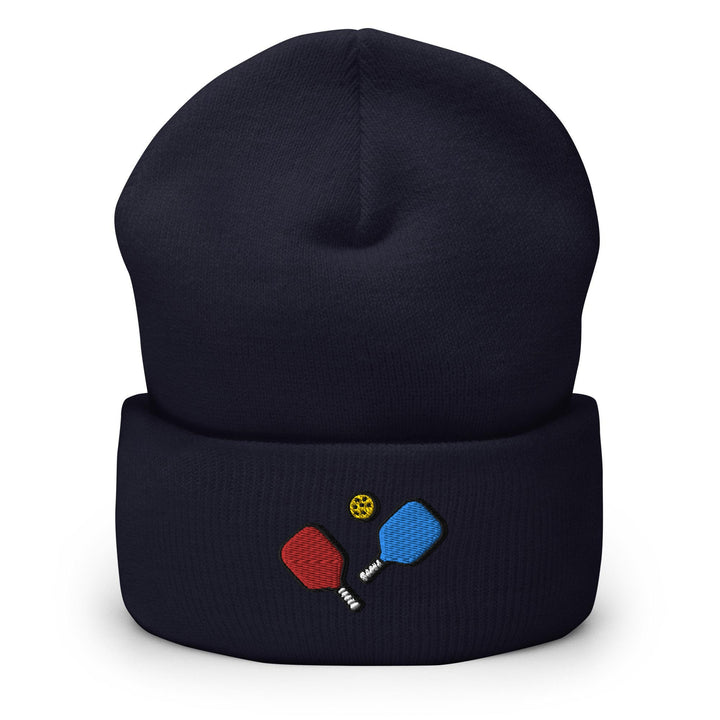 a beanie with two ping pong paddles on it