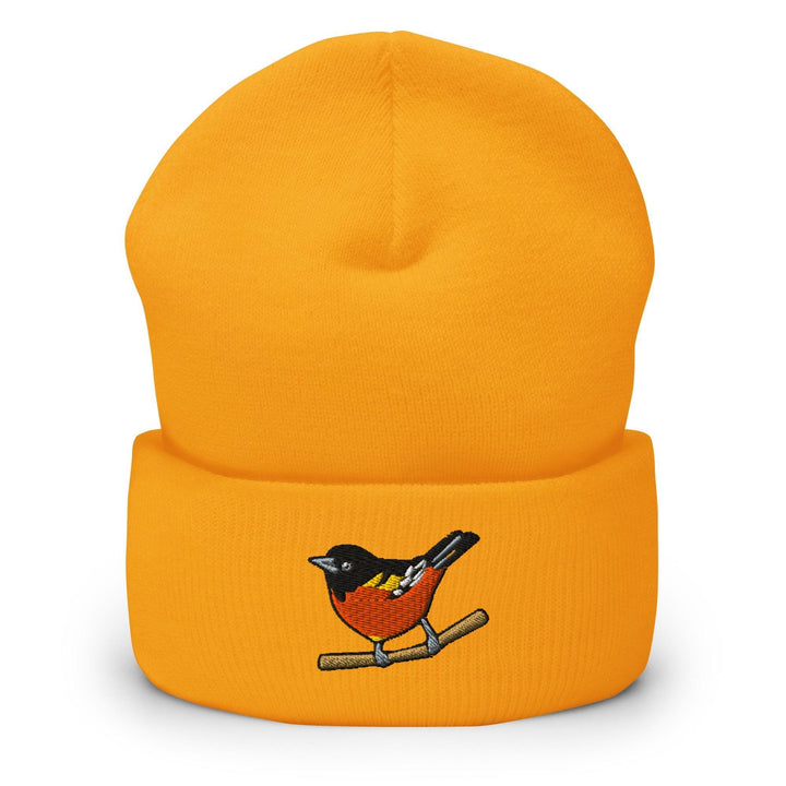 a yellow hat with a bird on it