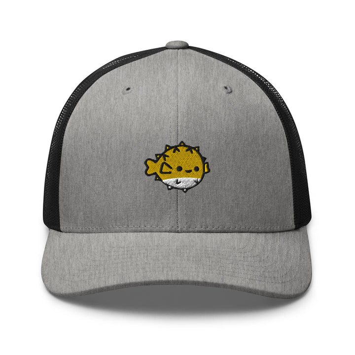 a gray and black hat with a yellow cat on it