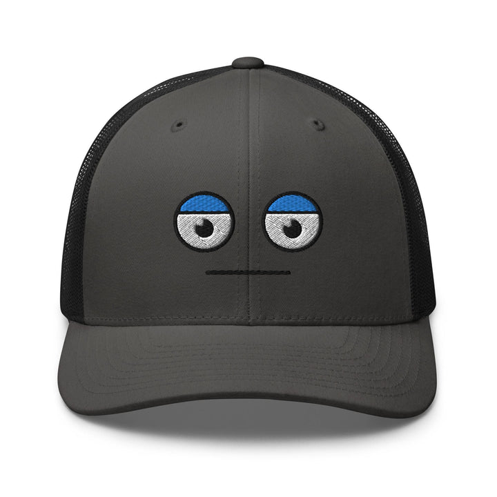 a gray and black hat with a face drawn on it