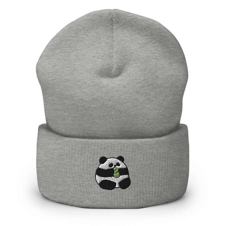 a grey beanie with a panda bear on it