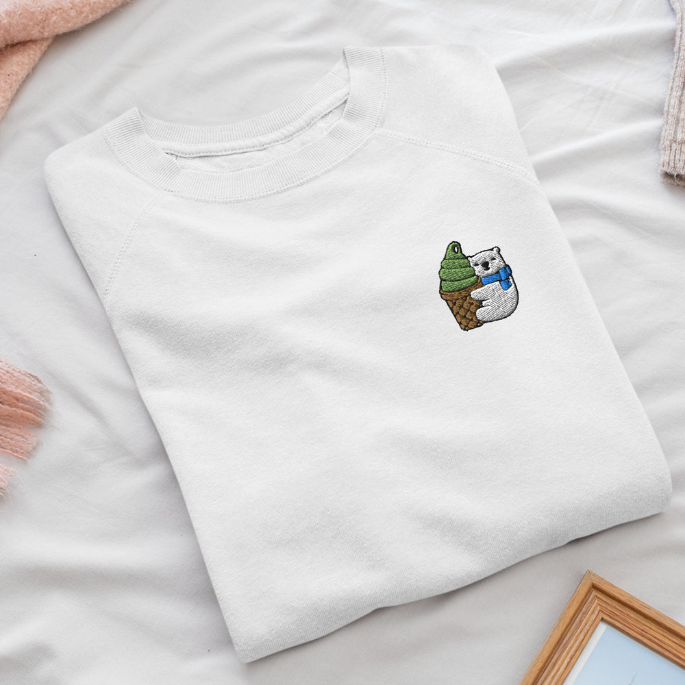 a white t - shirt with a picture of a cat on it