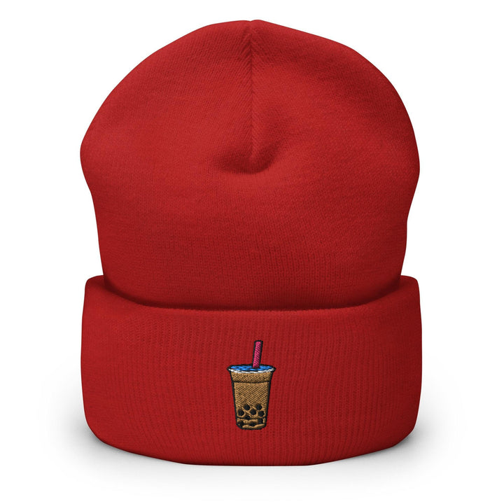 a red beanie with a drink in it