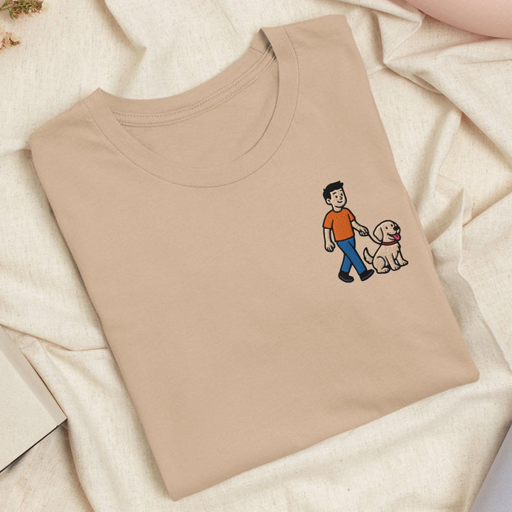 a t - shirt with a picture of a man and a dog on it