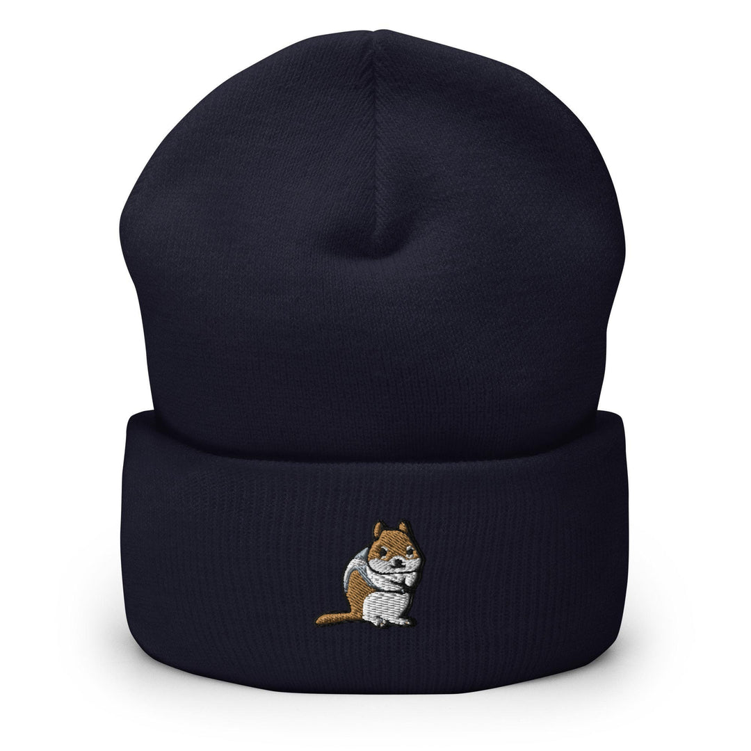 a blue beanie with a cartoon cat on it