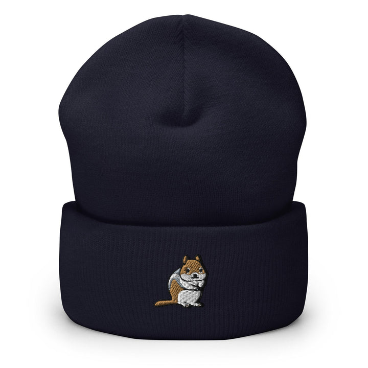 a blue beanie with a cartoon cat on it