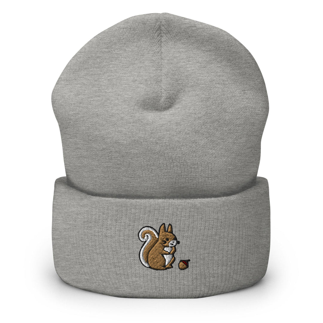 a grey beanie with a squirrel eating an apple