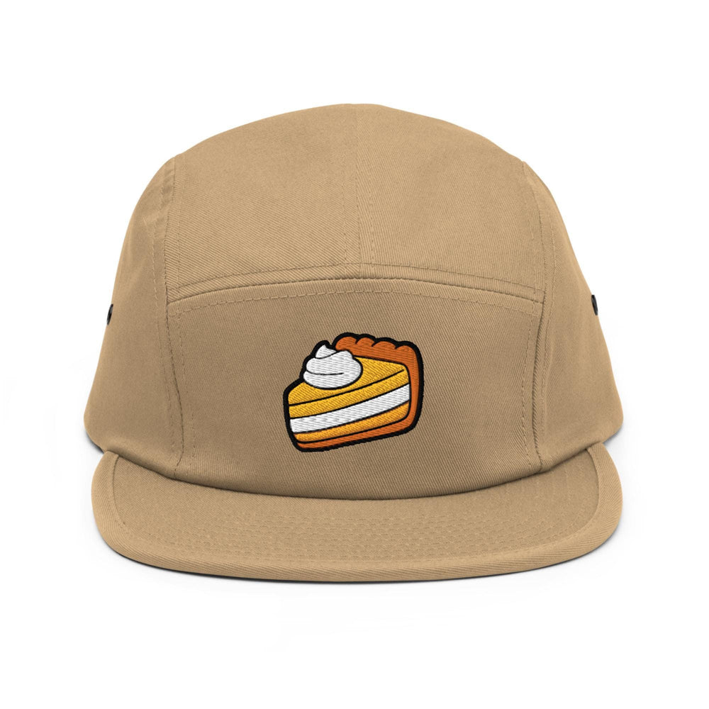 a brown hat with a piece of cake on it