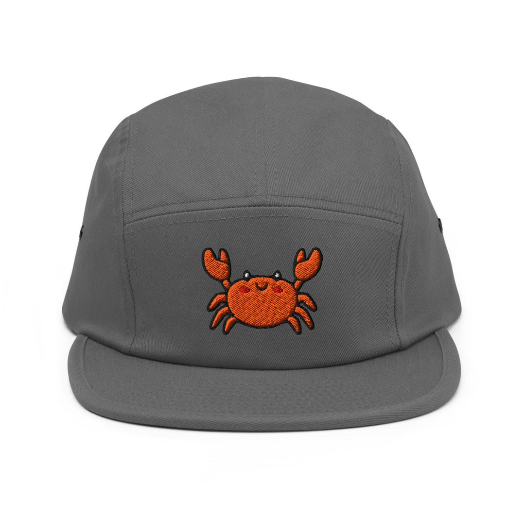 a gray hat with a crab embroidered on it