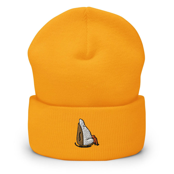 a yellow beanie with a picture of a snowboarder on it