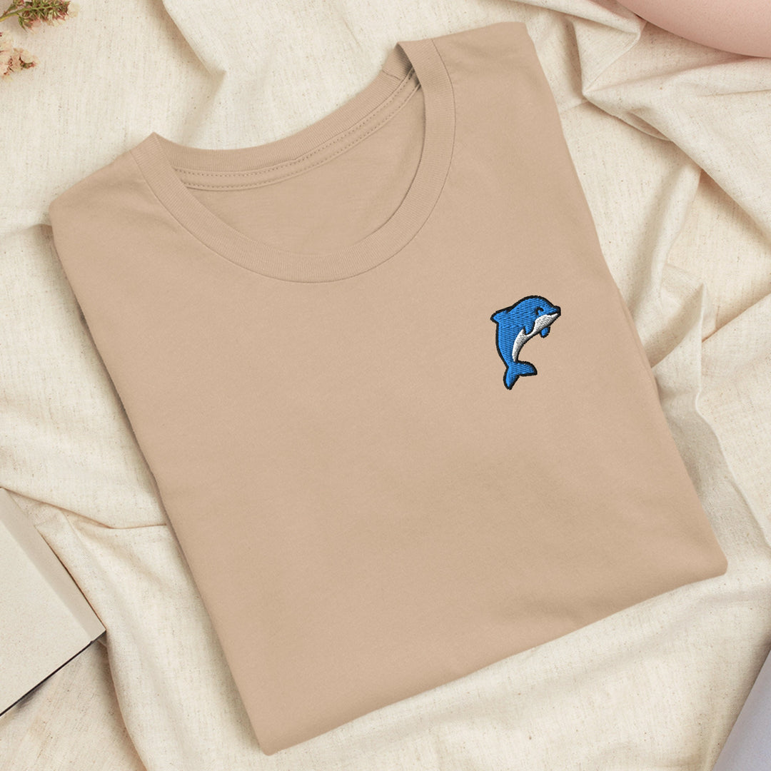 a t - shirt with a dolphin embroidered on it