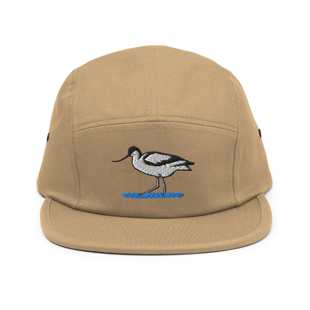 a brown hat with a bird embroidered on it