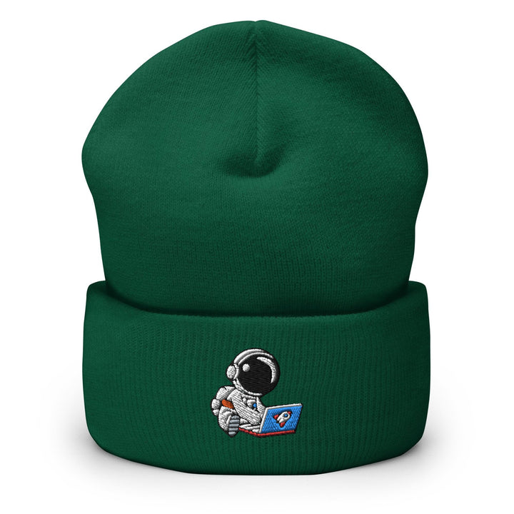 a green beanie with an astronaut on it
