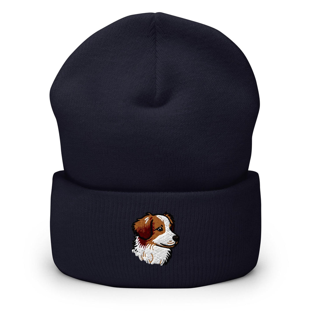 a black beanie with a brown and white dog on it
