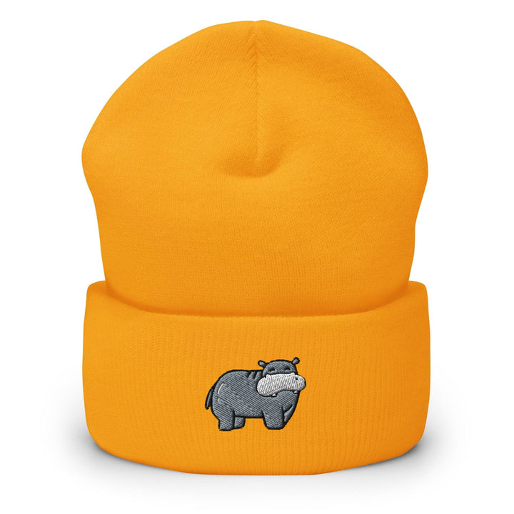 a yellow beanie with a rhinoceros embroidered on it