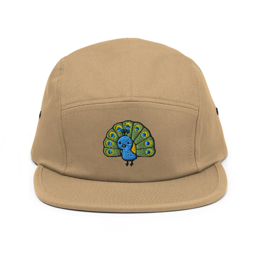 a tan hat with a peacock embroidered on it