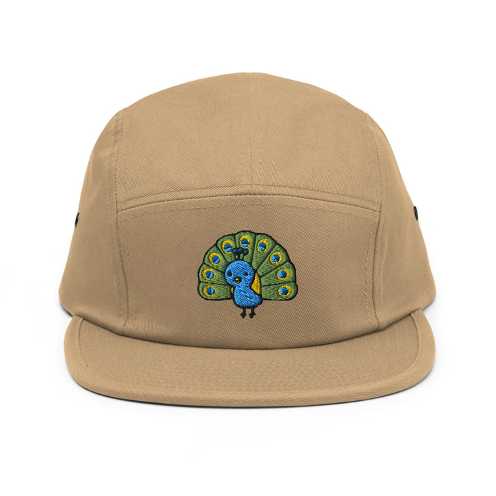 a tan hat with a peacock embroidered on it