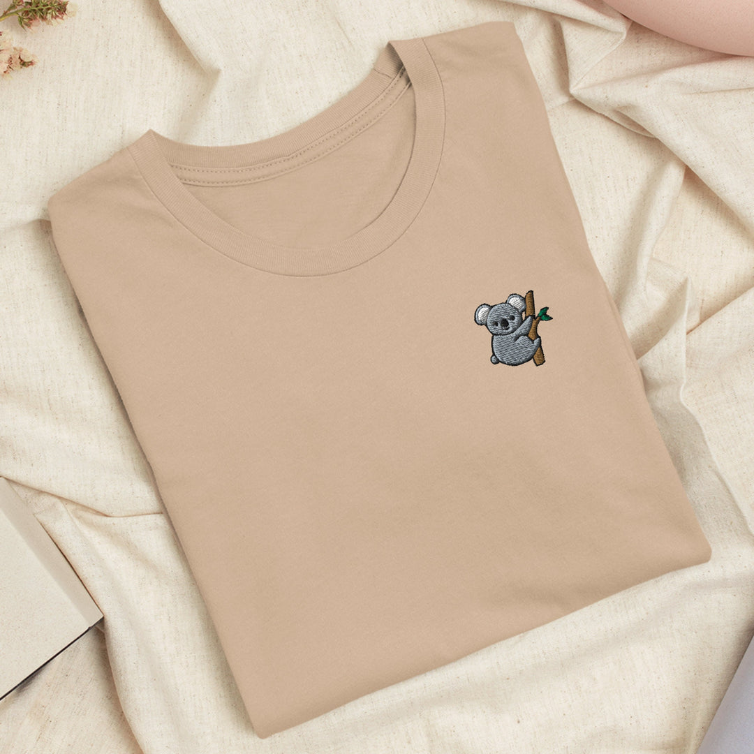a t - shirt with a picture of a koala on it