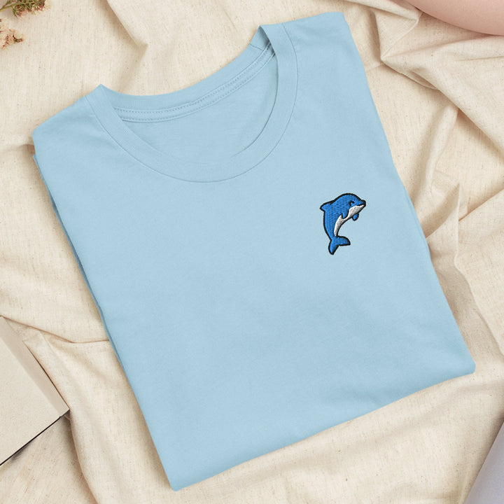 a blue t - shirt with a dolphin embroidered on it