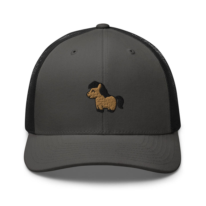 a gray and black trucker hat with a dog embroidered on the front