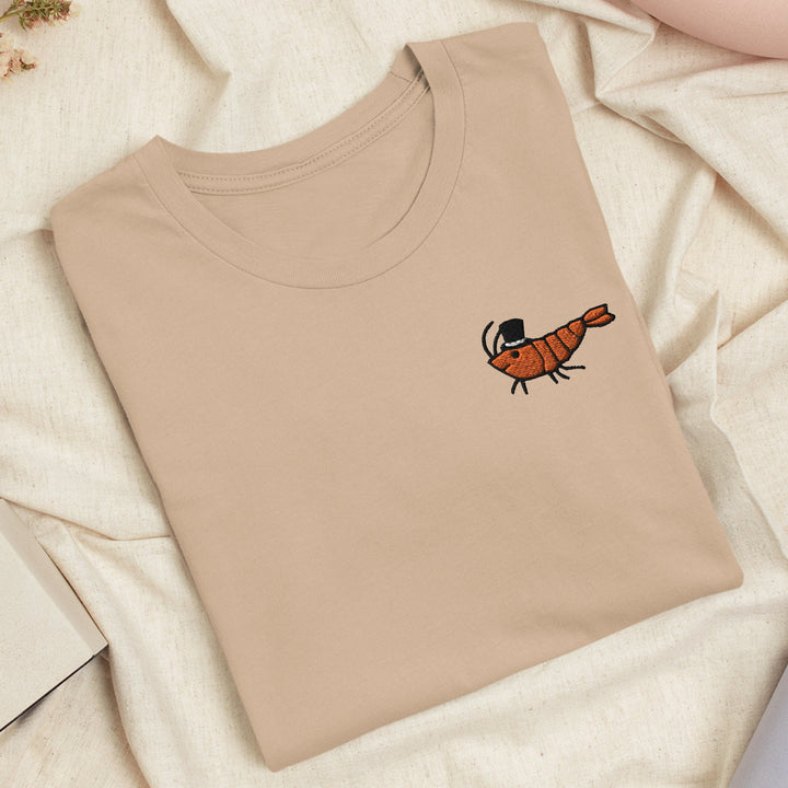 a t - shirt with a picture of a bug on it