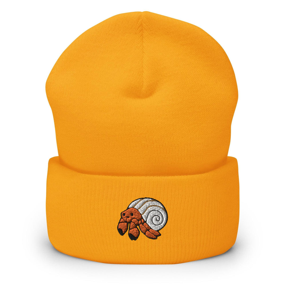 a yellow beanie with a picture of a snail on it