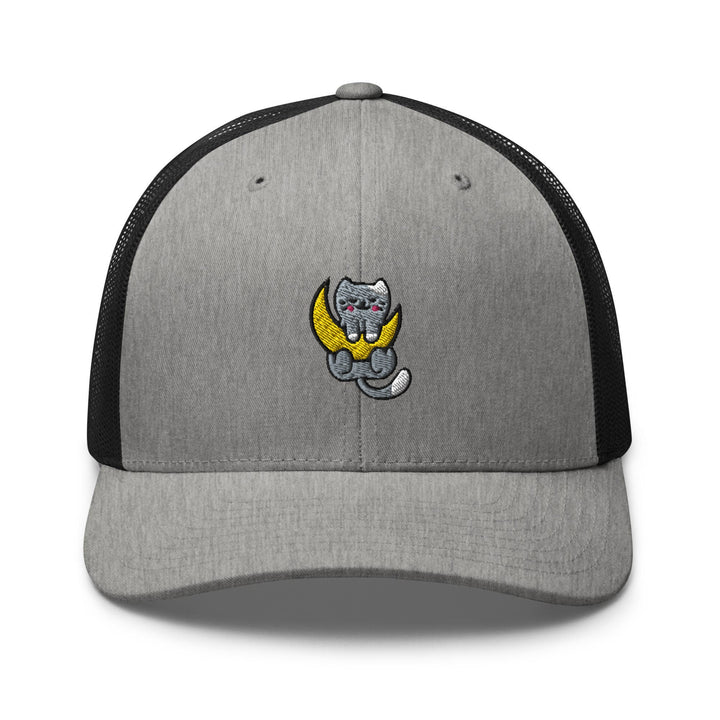 a gray and black trucker hat with a cartoon cat sitting on the moon