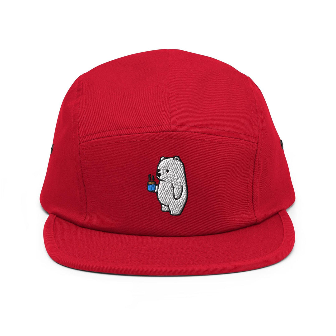a red hat with a polar bear embroidered on it
