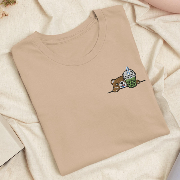 a t - shirt with a picture of a teddy bear on it