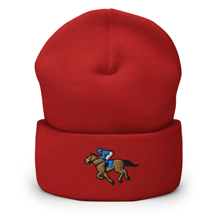 a red hat with a horse and jockey on it