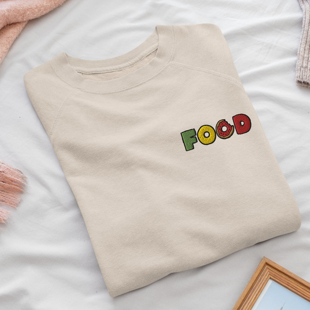 a white t - shirt with the word food on it