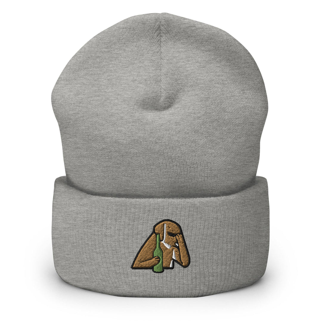 a grey beanie with a picture of a hand holding a green leaf