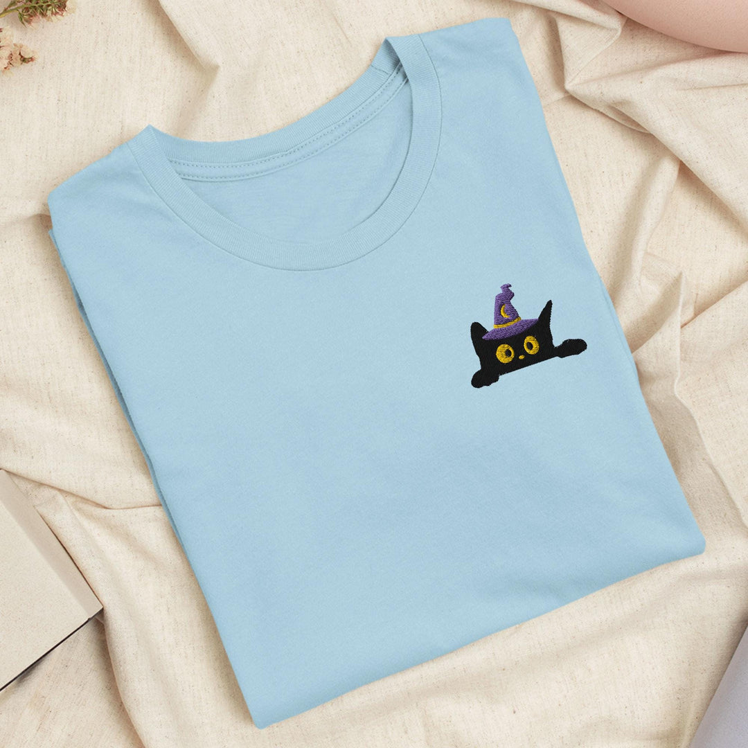 a t - shirt with a picture of a cat on it