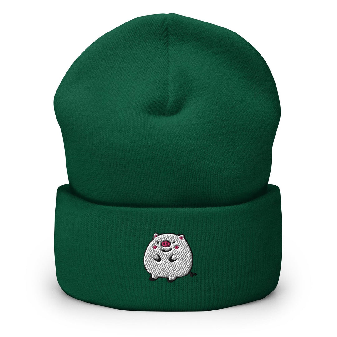 a green beanie with a white bear on it