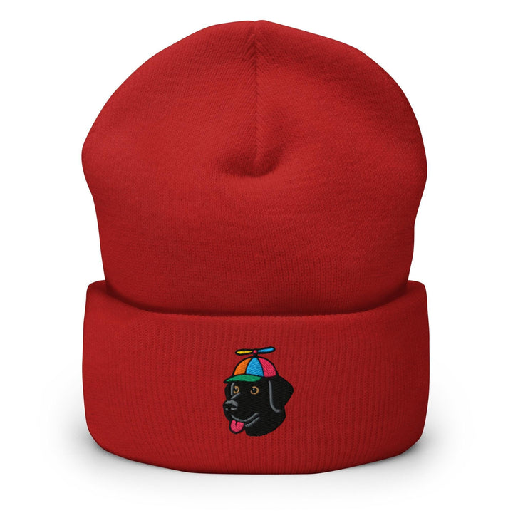 a red hat with a black dog on it
